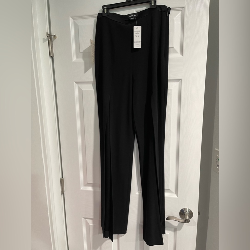 NWT Bebe palazzo/ wide leg pants in black.